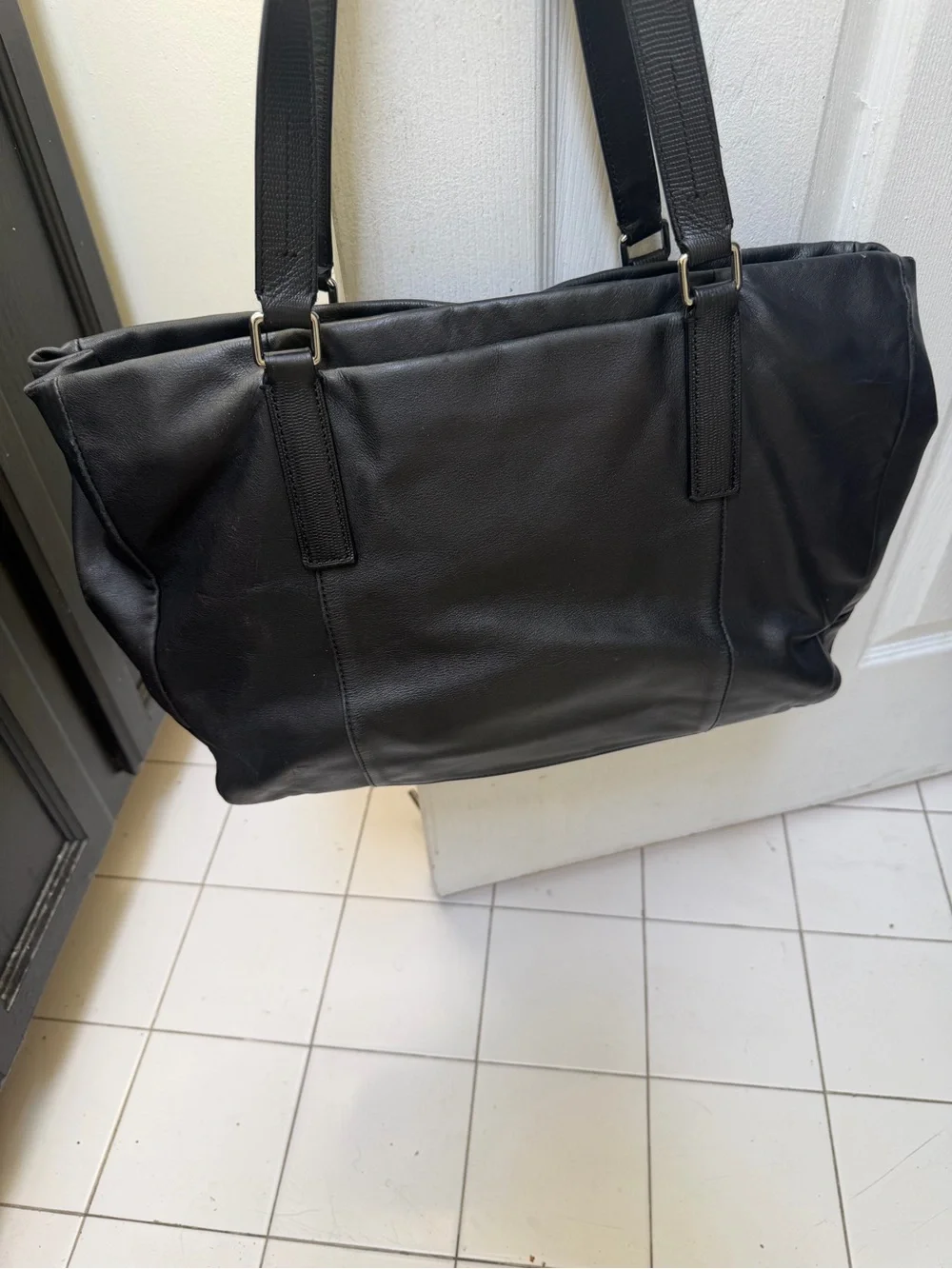 Tumi Black 100% Leather Tote Bag with padded laptop sleeve